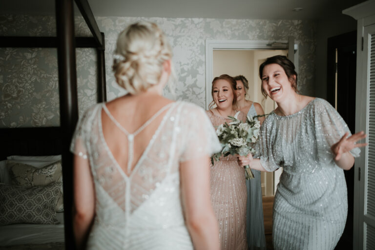 A bride's big dress reveal at her wedding venue