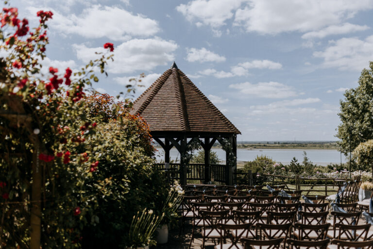 A ceremony under the Oak Gazebo at outdoor wedding venue The Ferry House in Kent.