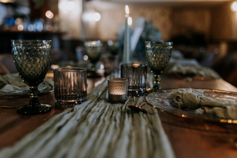 A wedding breakfast table laid up at the barn wedding venue The Ferry House in Kent.