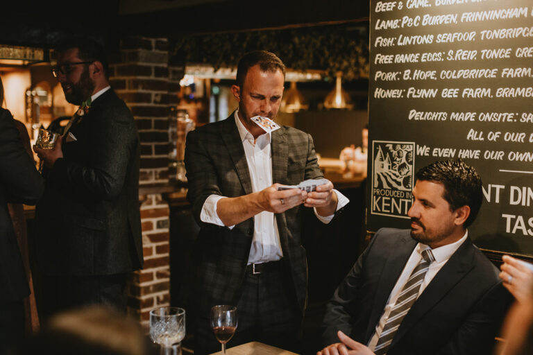 A magician performing at a party.